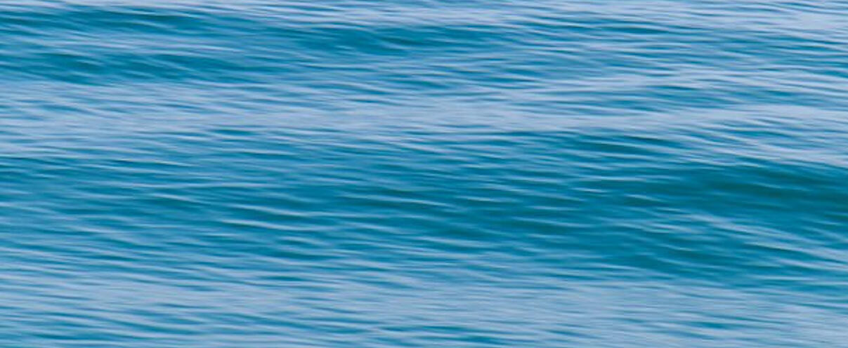 close up of gentle blue ocean waves