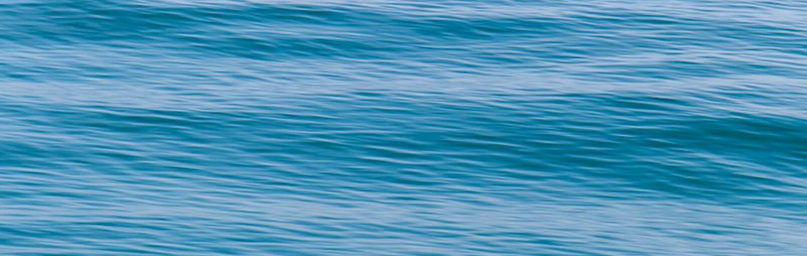 close up of gentle blue ocean waves